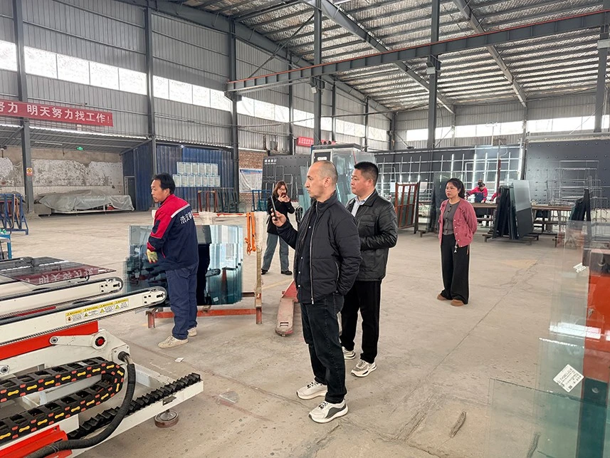 Customer and neighbours viewing 93 Series aluminium windows at a home project in Zafar, Tashkent
