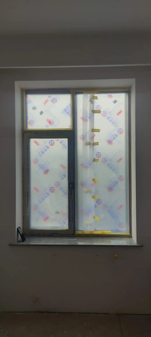 Customer and neighbours viewing 93 Series aluminium windows at a home project in Zafar, Tashkent
